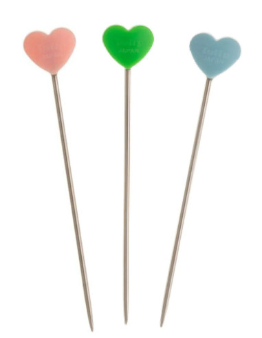 Rosa, blaue, grüne Stricknadeln Tulip