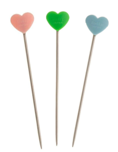Rosa, blaue, grüne Stricknadeln Tulip